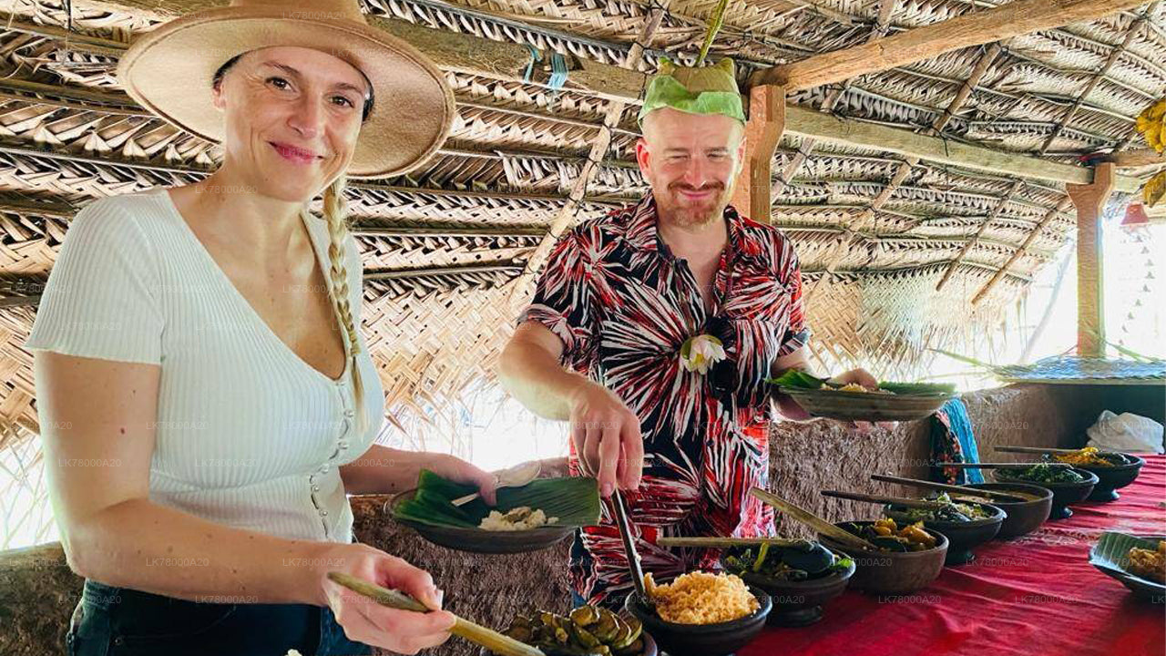 Two people preparing food at a table with various dishes in a rustic setting.